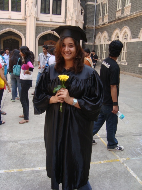 The funny hat and gown :D